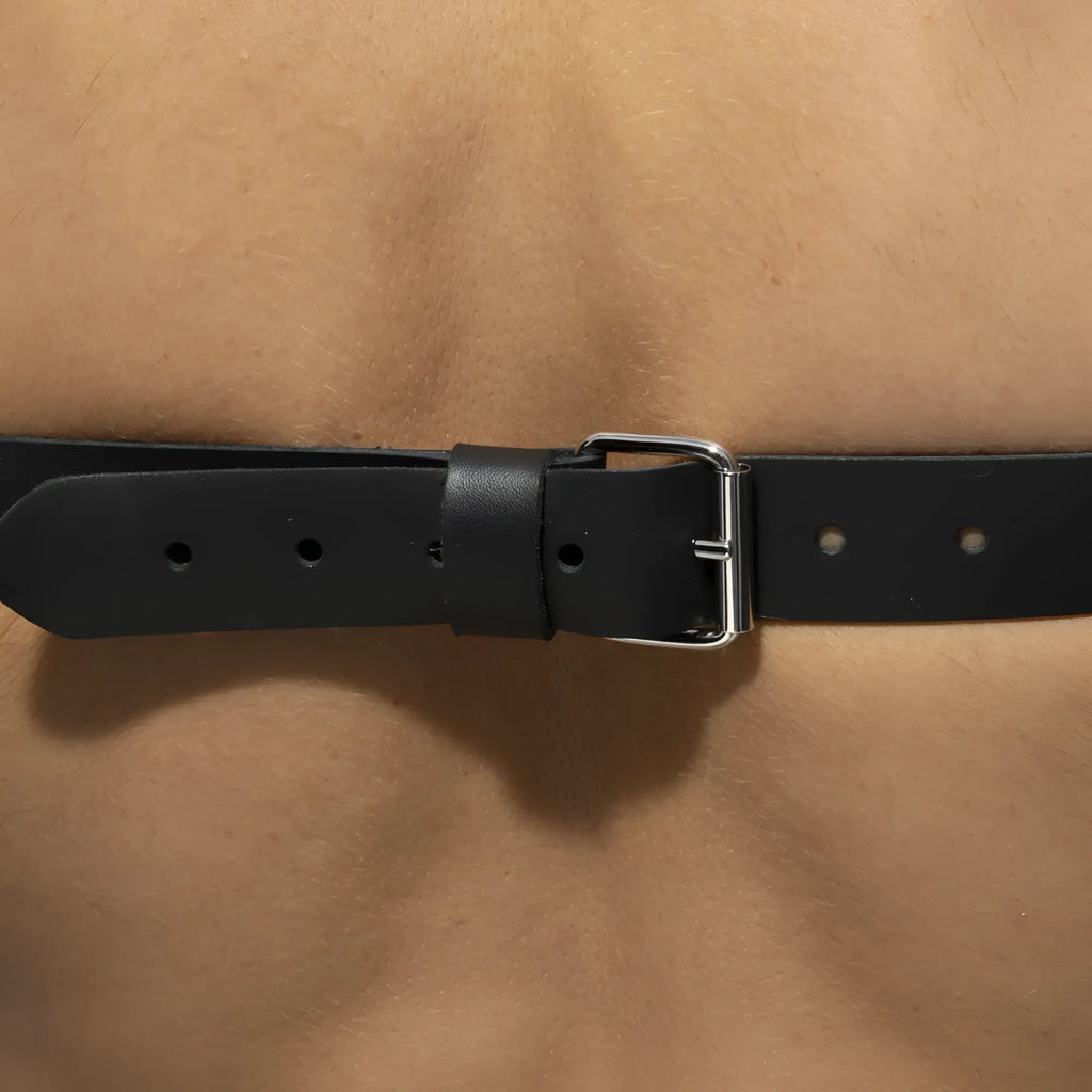 Black leather belt with silver-toned buckle x-cross leather harness featuring durable leather and stylish design