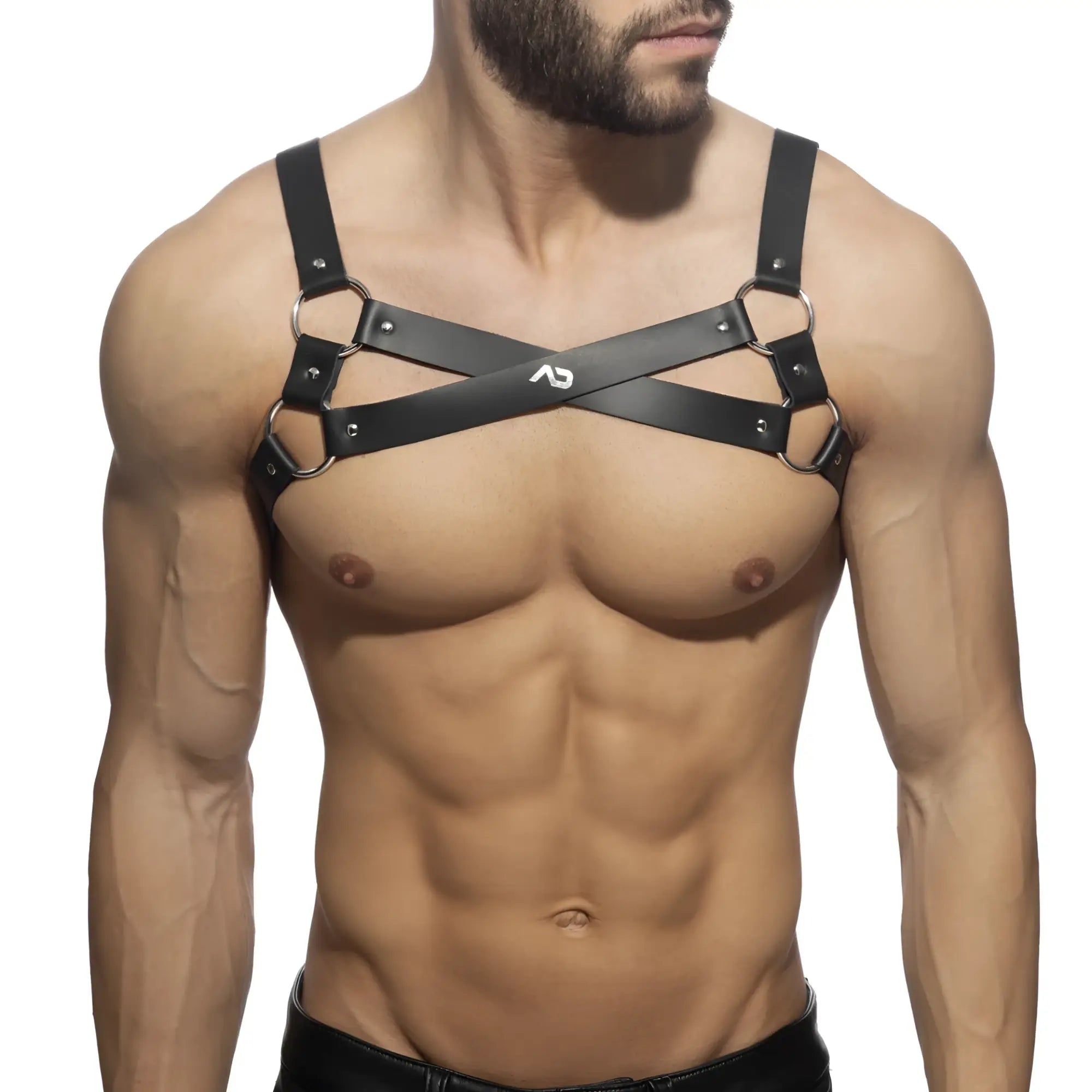 X-cross leather harness with cross-over design black leather featuring silver metal rings and studs across the chest