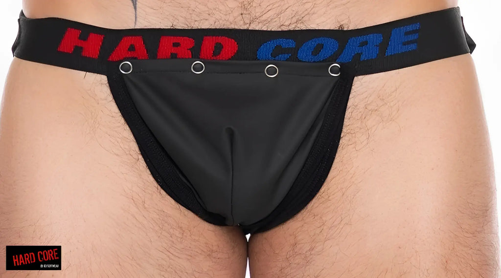 Black pleather x jockstrap with cod piece featuring red and blue lettering on the waistband