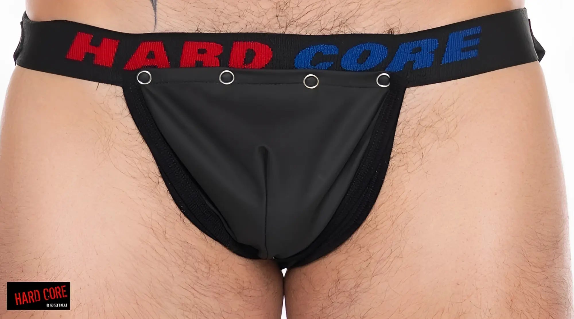 Black pleather x jockstrap with cod piece featuring red and blue lettering on the waistband