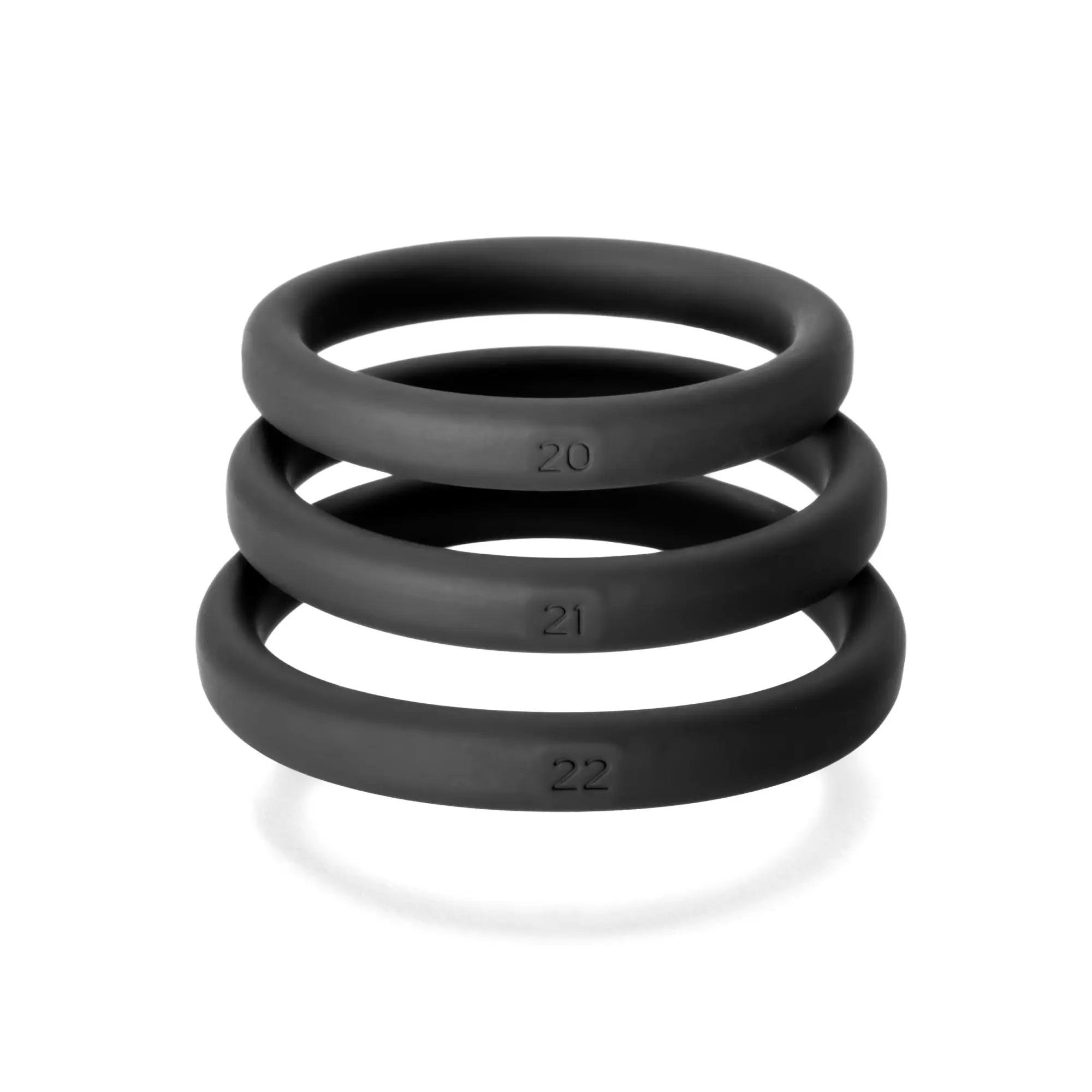 Set of three black xact-fit silicone rings with size numbers marked for comfortable secure wear