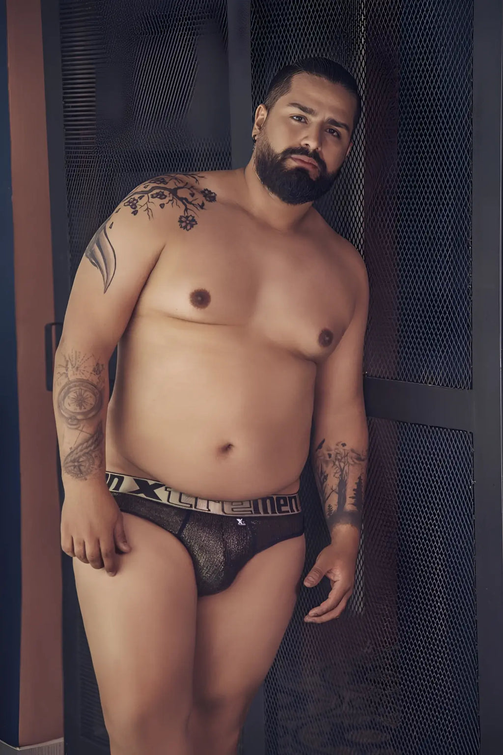 Black lace men’s microfiber thong with white and gray xtremen branded waistband in black color front view