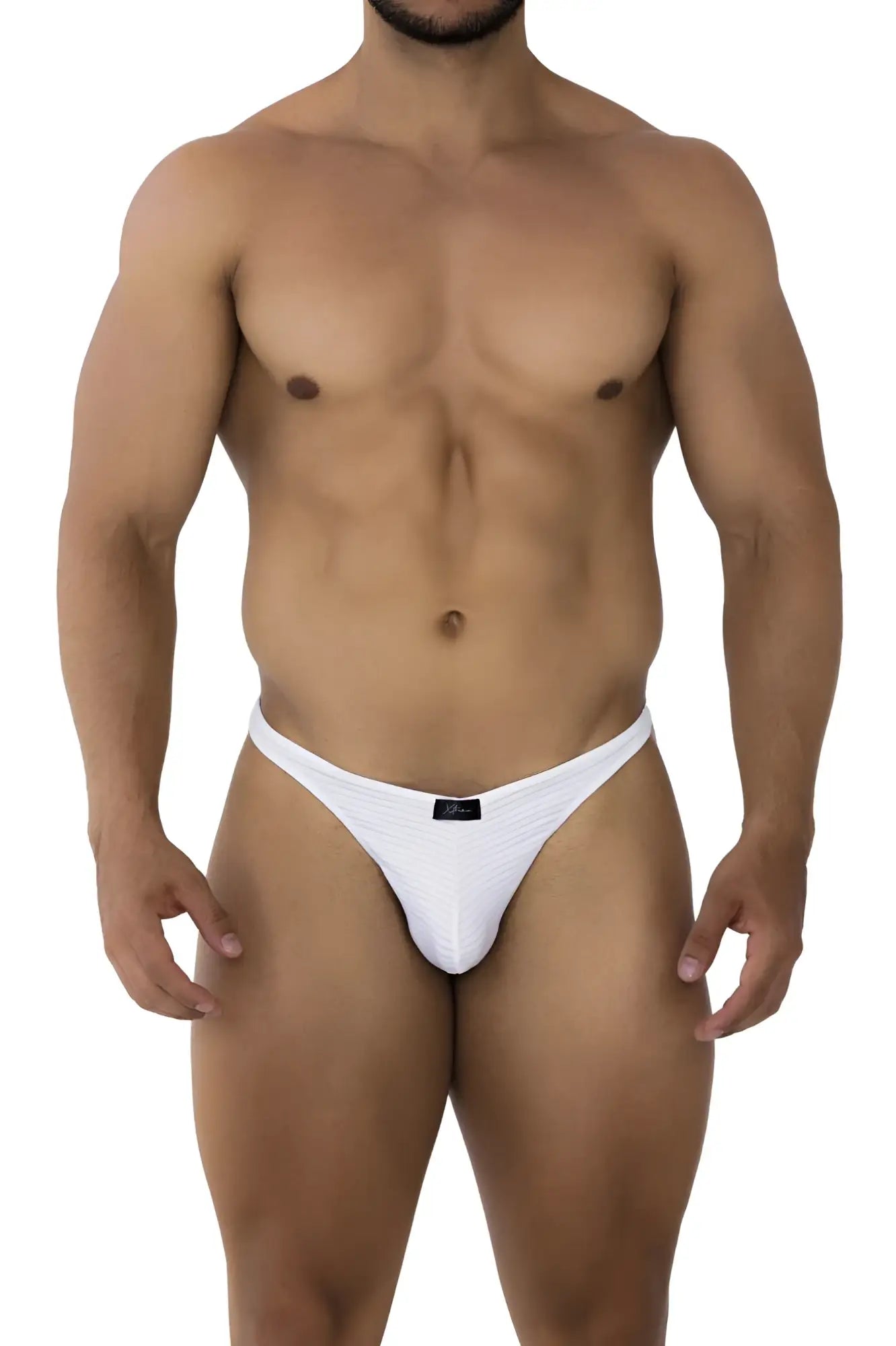 White xtremen 91198 jacquard thong for men with a small black brand tag at the center of the waistband