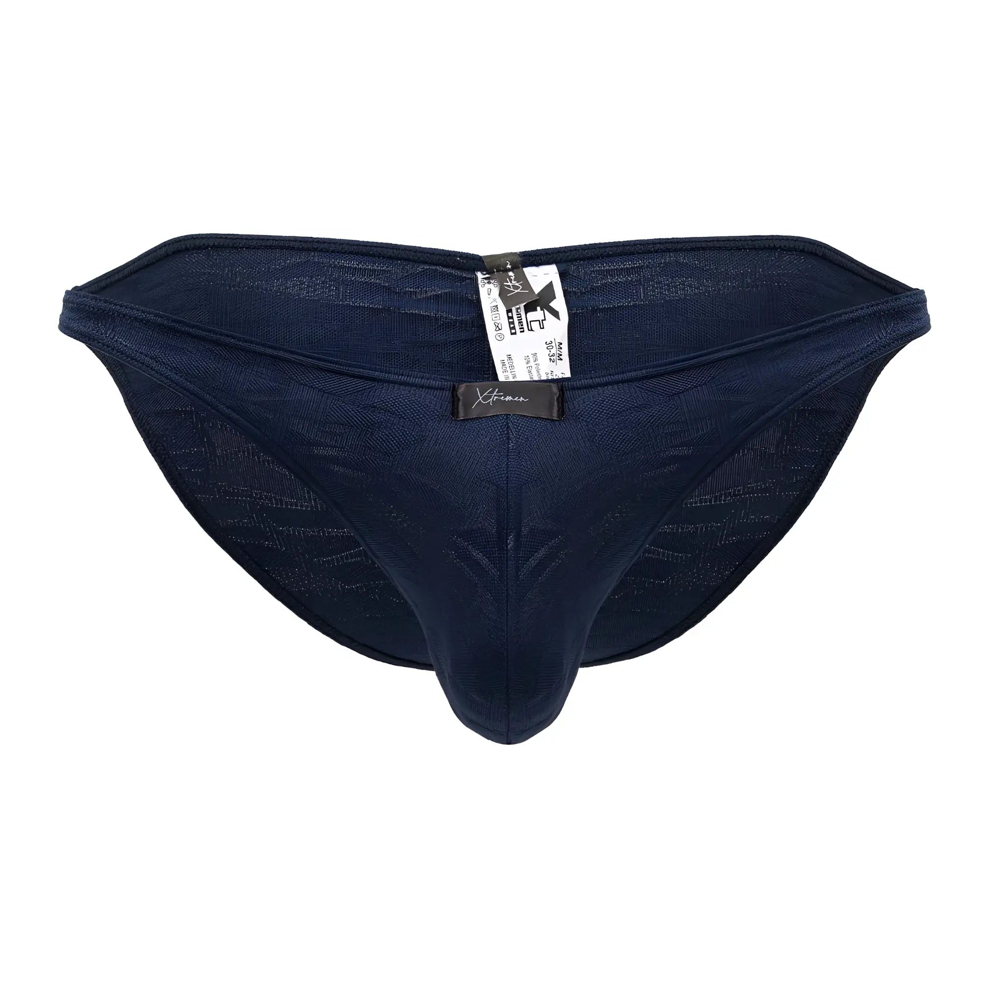 Navy blue xtremen 91201 jacquard bikini briefs with textured fabric and branded tag visible on the back side