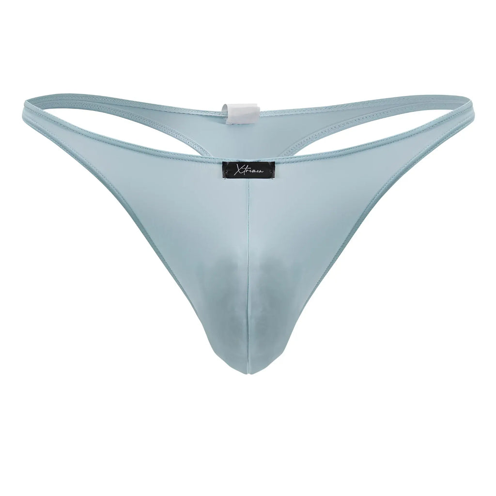 Light blue sheer mesh thong with black xtremen brand tag made of microfiber in color seawater front view