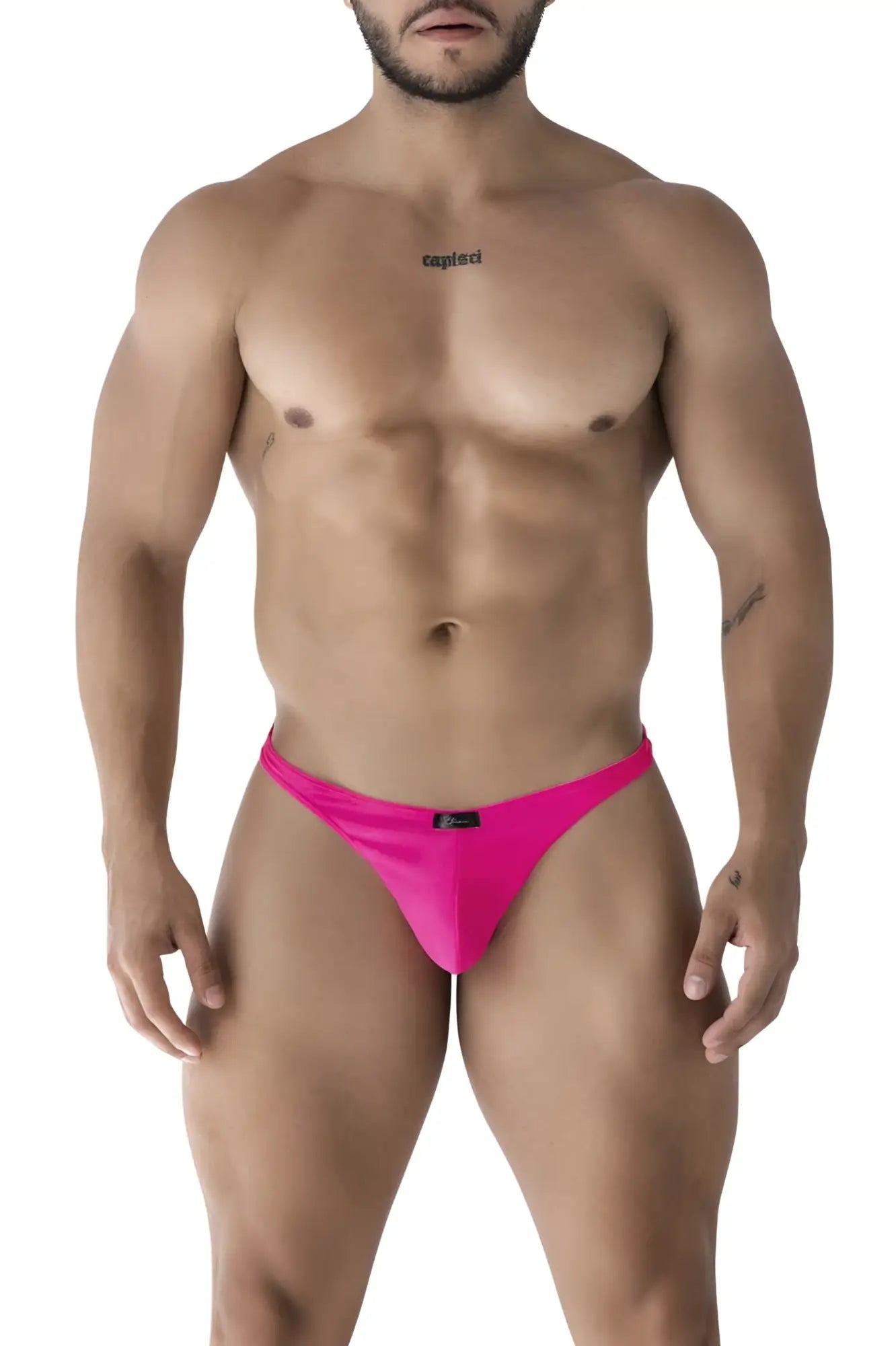 Bright pink xtremen 91232 microfiber thong with smooth fabric and small black brand tag at waistband back side