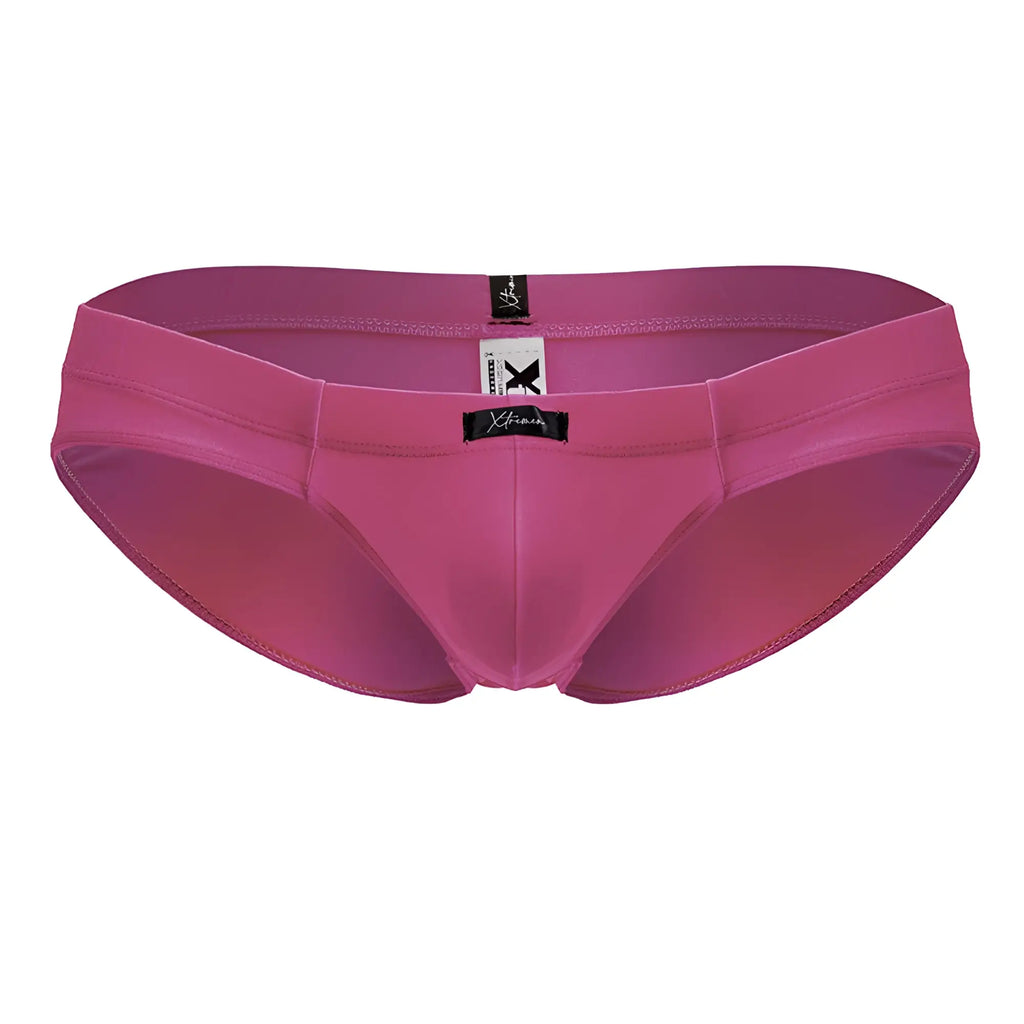 A sleek fuchsia xtremen 91233 microfiber brief with smooth form-fitting fabric and subtle stitching details