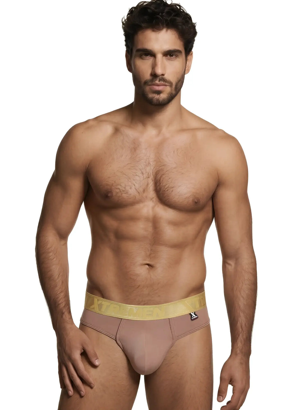 Xtremen men's thong in dusty rose with a gold logo waistband, worn by a fit model.