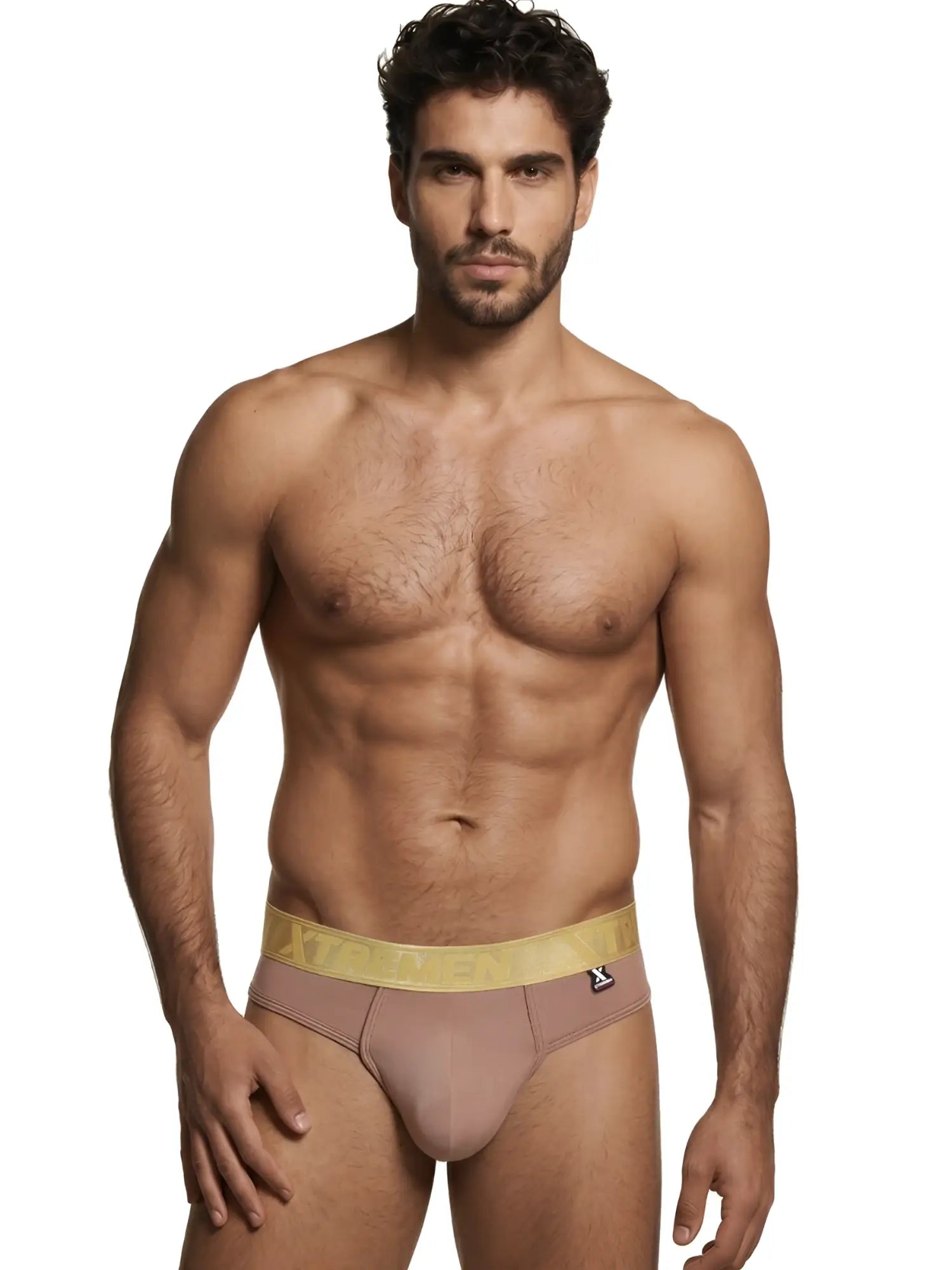 Xtremen men's thong in dusty rose with a gold logo waistband, worn by a fit model.
