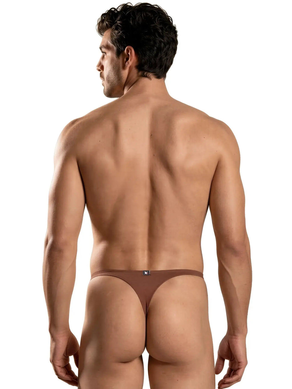 A man wearing brown Xtremen thongs, shown from a rear view against a white background.