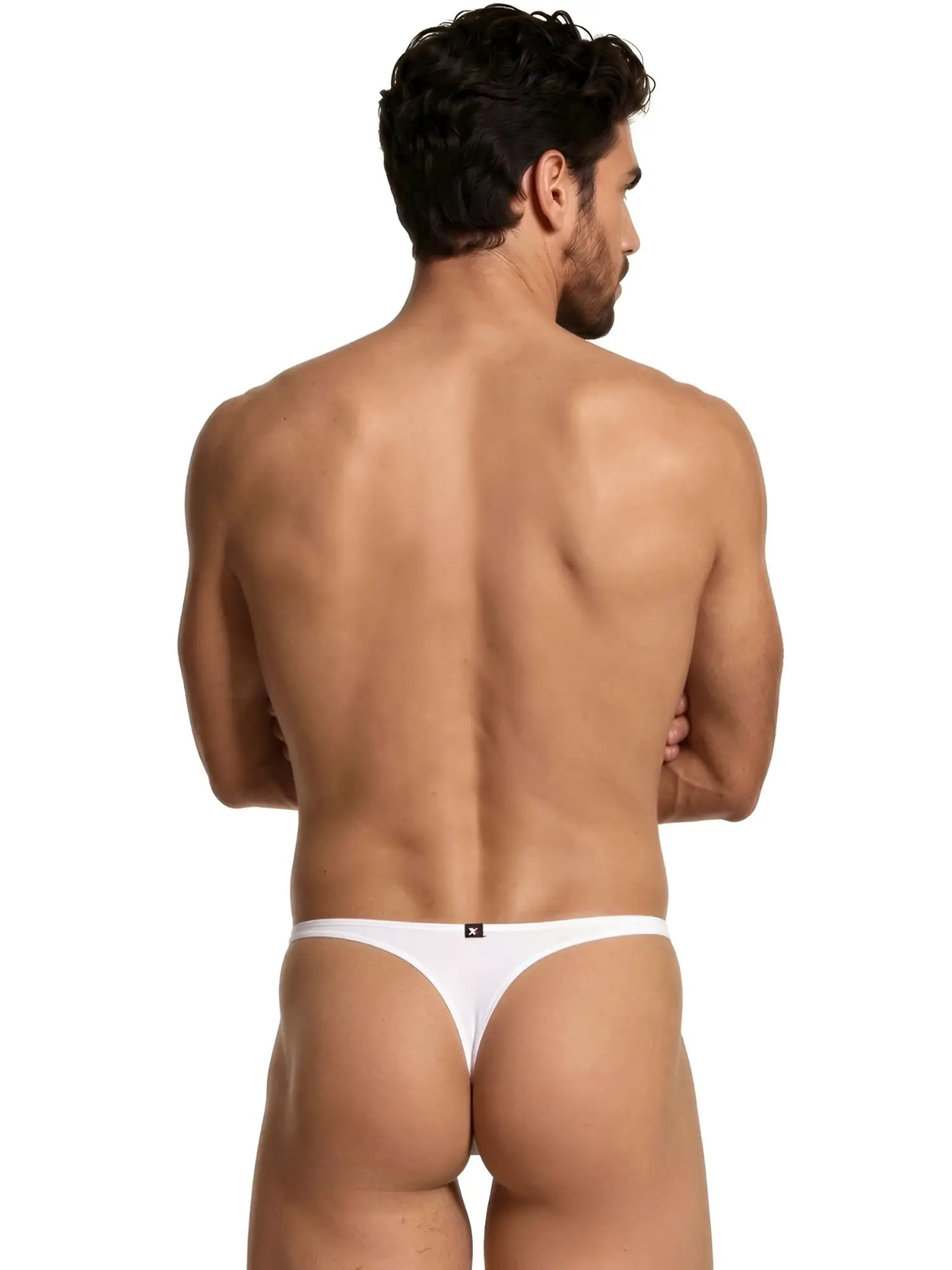 Xtremen white men's thong underwear with a small branded logo tag on the back waistband.