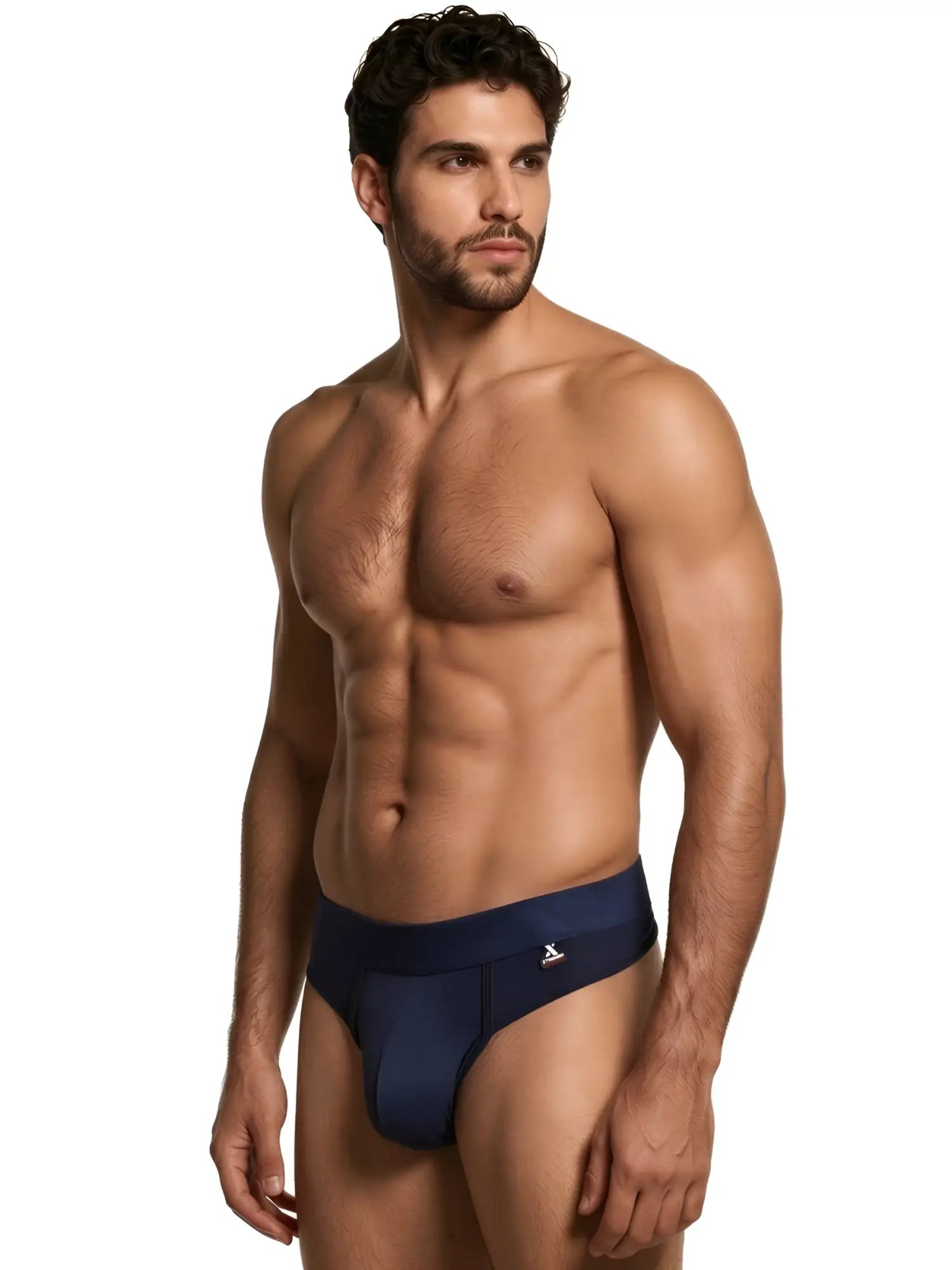 Xtremen navy blue men's thong underwear with a branded waistband worn by a shirtless man.