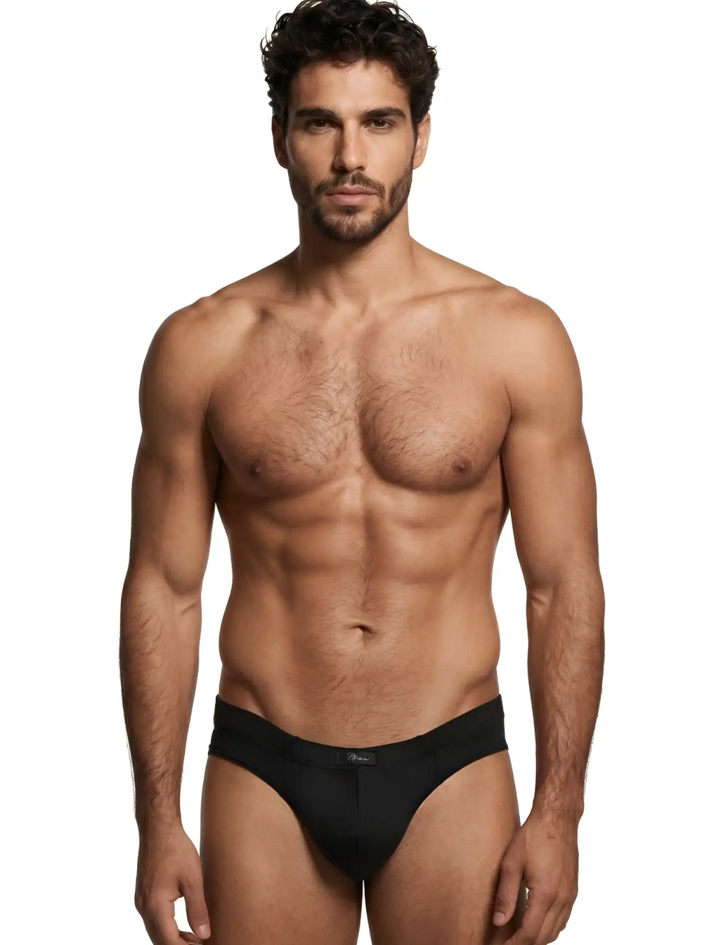 Xtremen black briefs on a fit man, showing a minimalist design with a centered brand tag.