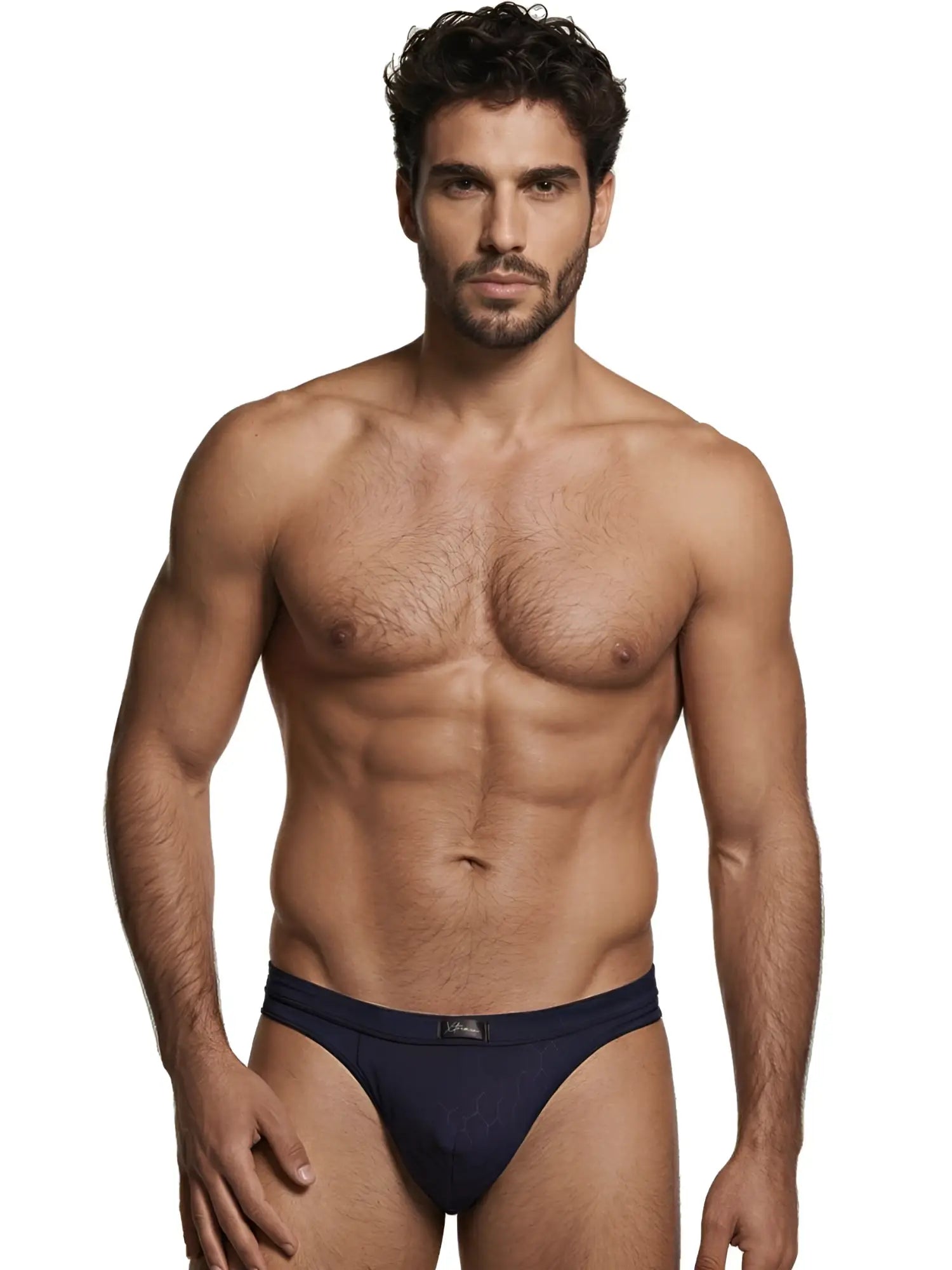 Model wearing navy blue Xtremen briefs with a subtle geometric pattern.