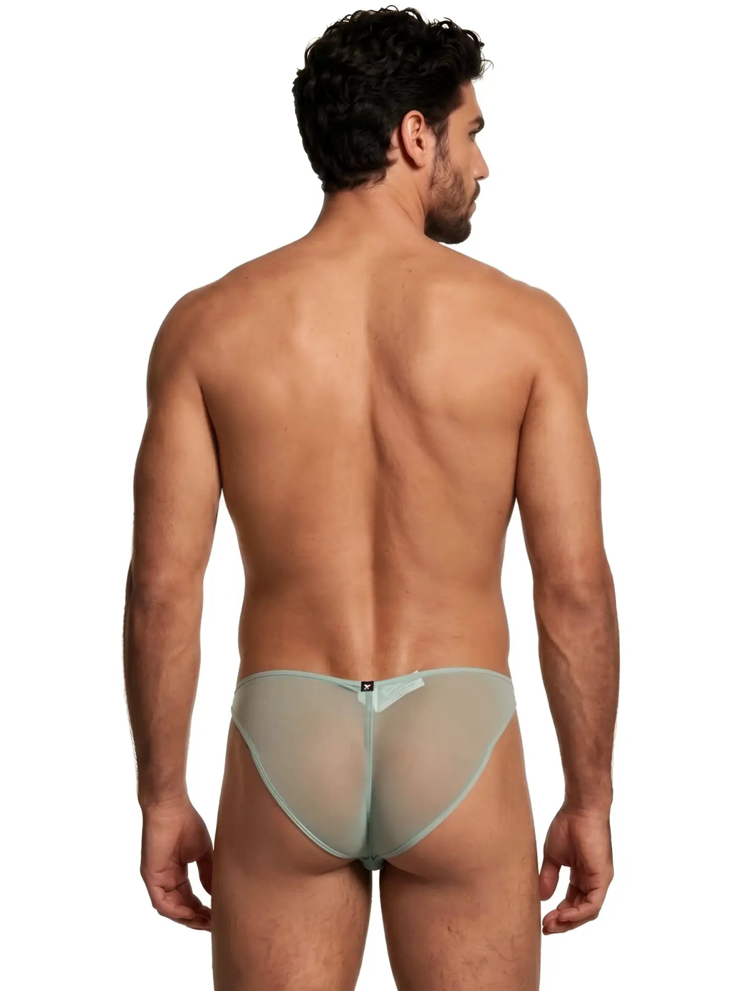 Back view of a man wearing a sheer, sage green Xtremen bikini brief.