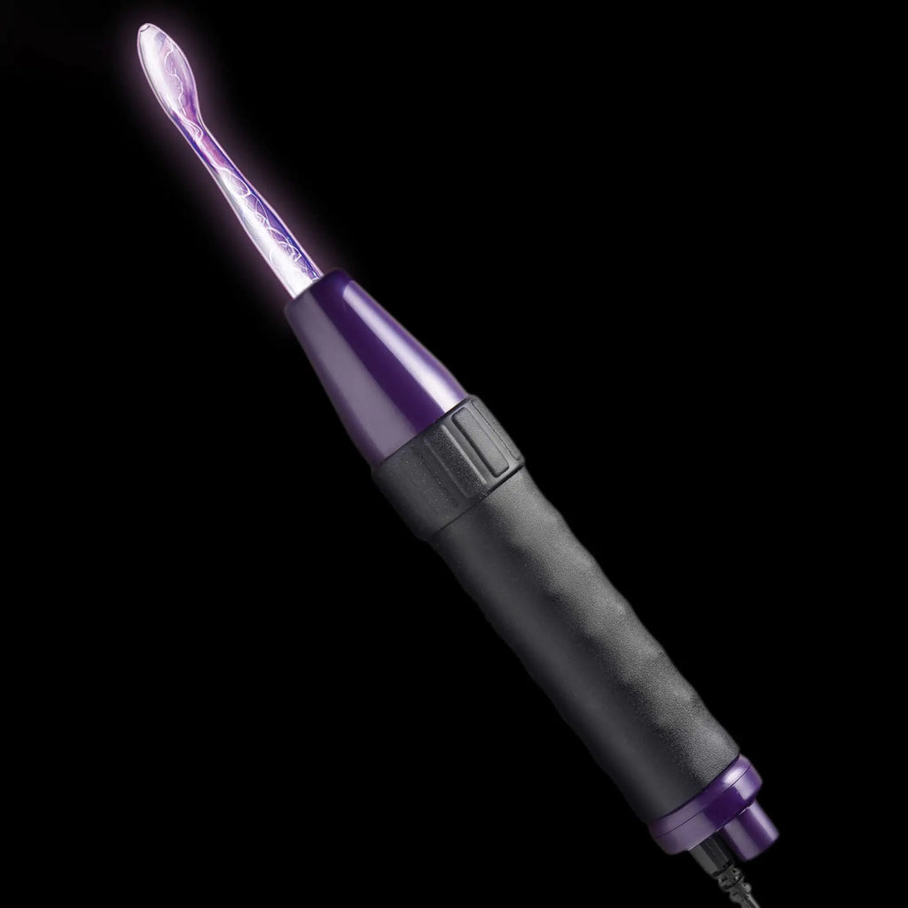 Zeus Electrosex Deluxe Twilight Violet Wand with a glowing purple electric glass probe and a black textured handle.