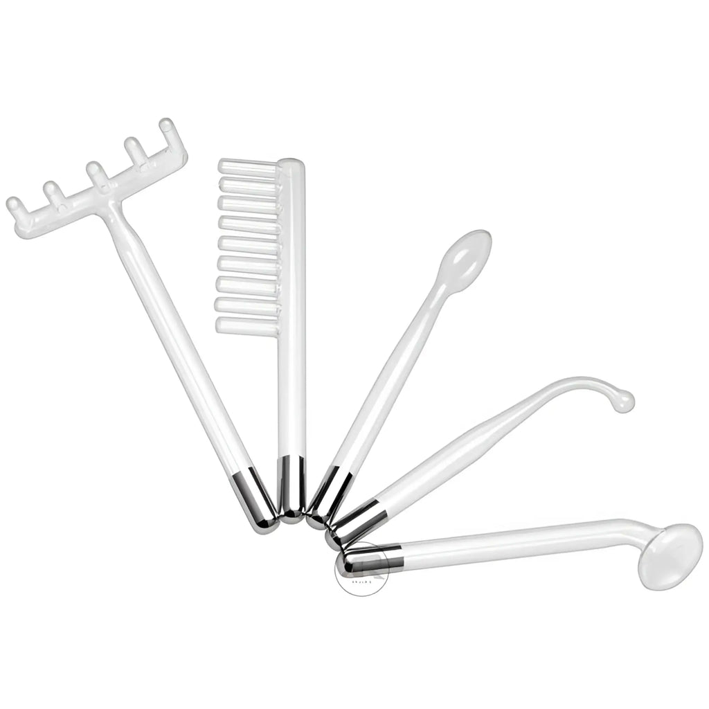 Zeus Electrosex Deluxe Twilight Violet Wand Kit: Five clear glass electrode attachments with silver metal bases.
