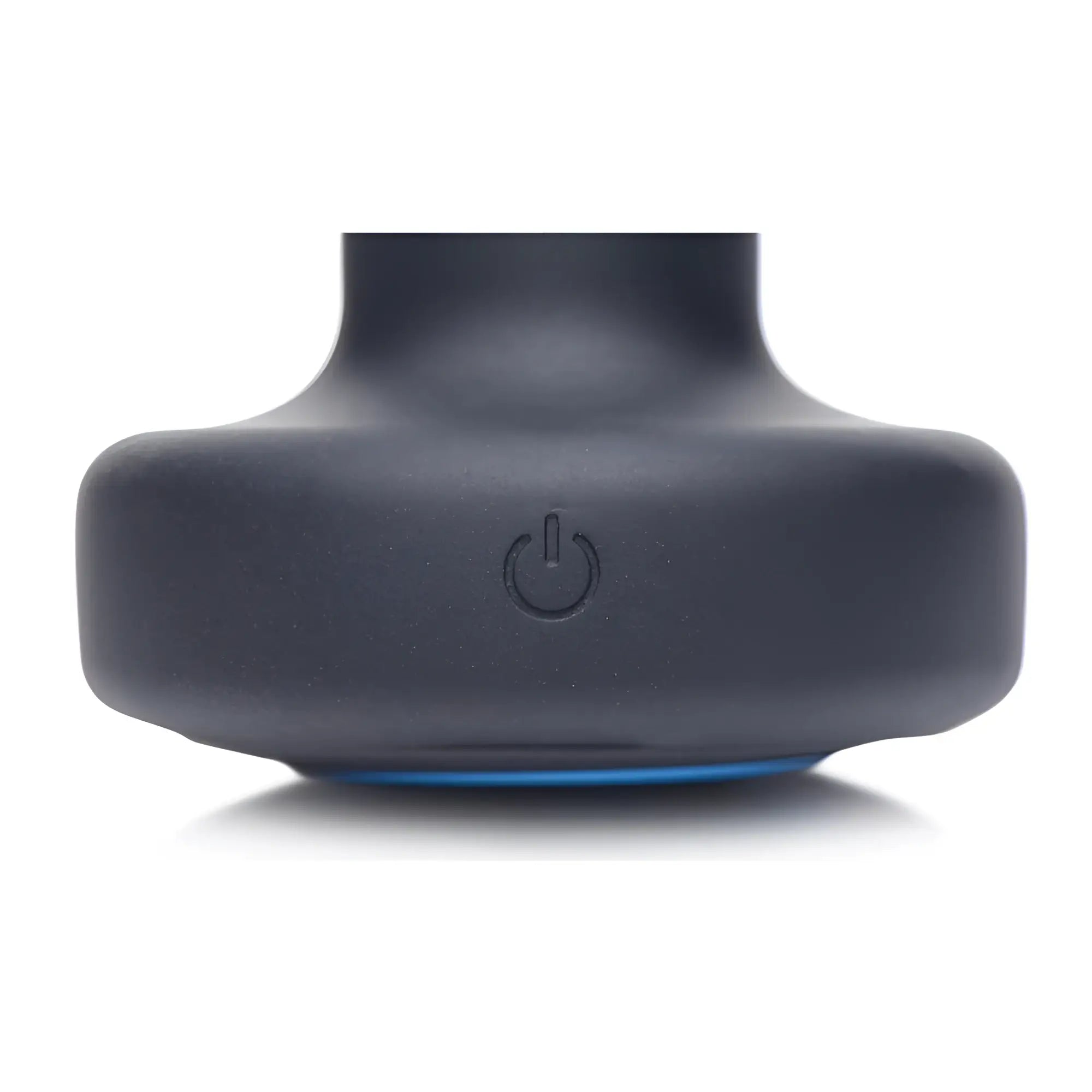 Close-up of the black silicone base of a Zeus E-Stim Pro anal plug, featuring a centered power button icon.