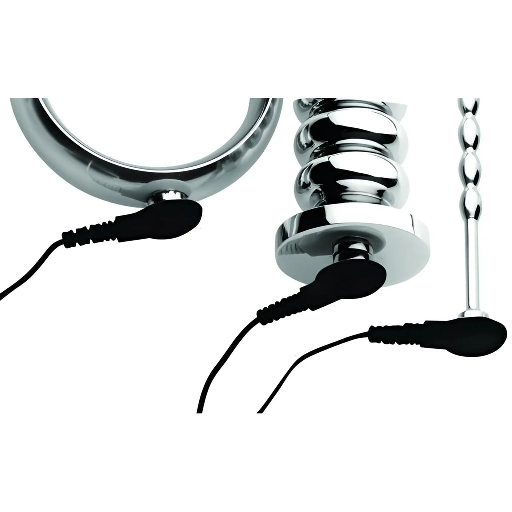 Zeus Electrosex Voltaic stainless steel male e-stim kit with chrome-finish accessories and connected black lead wires.